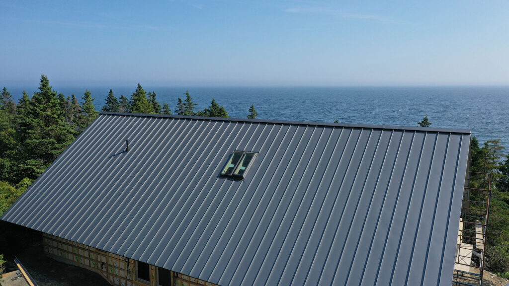 Standing seam metal roof panels in Queens County, manufactured by Klad.